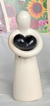 Person Holding a Heart