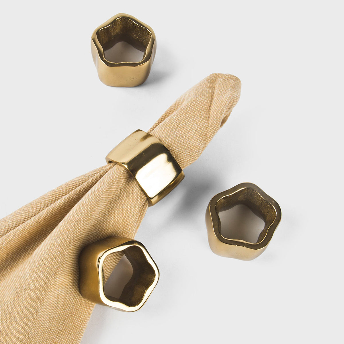 Gold Toned Sculpted Napkin Rings – Set of 4