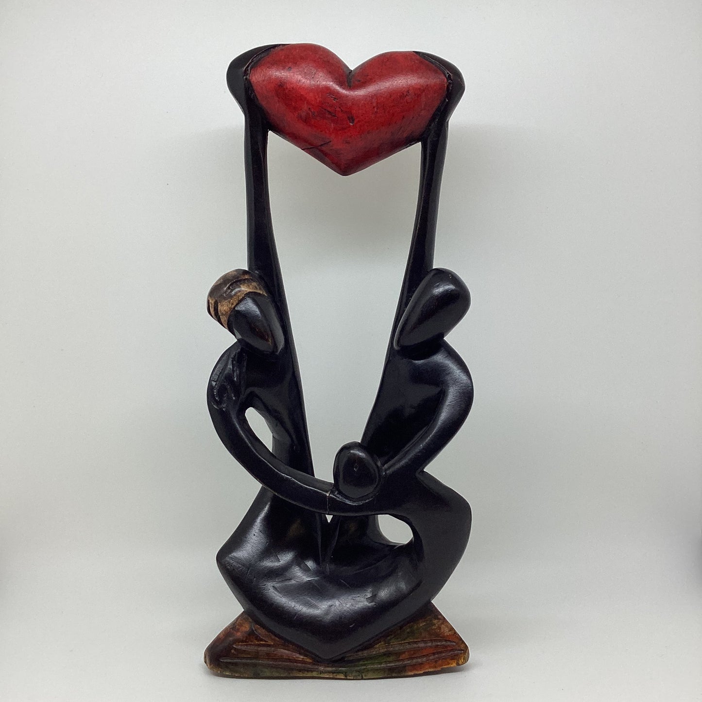 Uplifting Our Love wooden sculpture