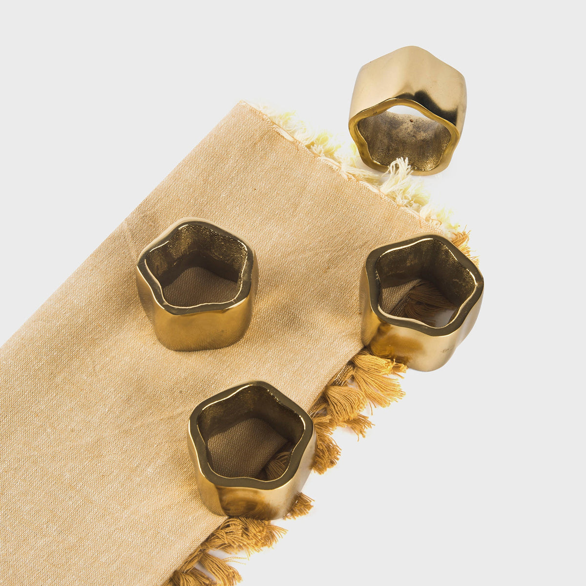 Gold Toned Sculpted Napkin Rings – Set of 4