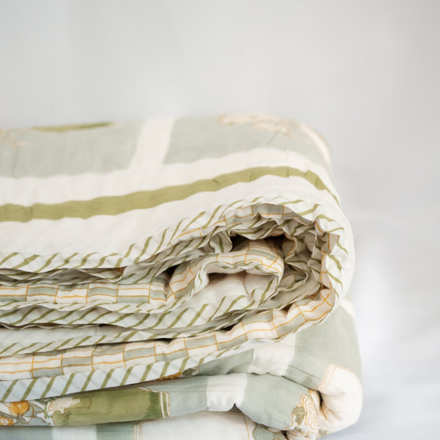 The Mona's Garden - Hand Block Printed Reversible Quilted Throw