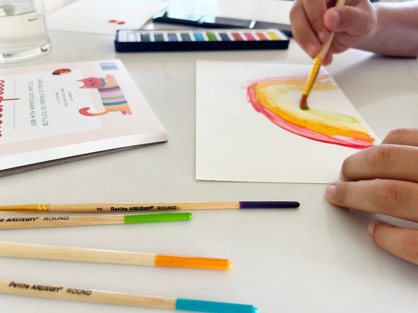 Five wood watercolor brushes sized and built for kid hands