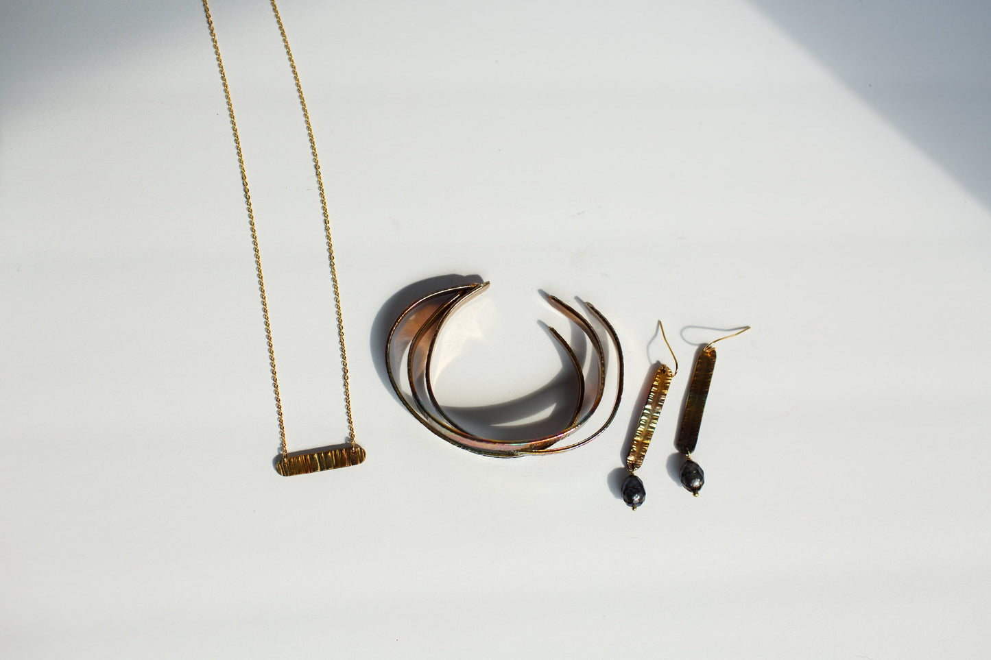 Refined Through Fire Earrings | FW Pearl & Repurposed Auto Copper Brake Line | Gold Plated Ear Wire