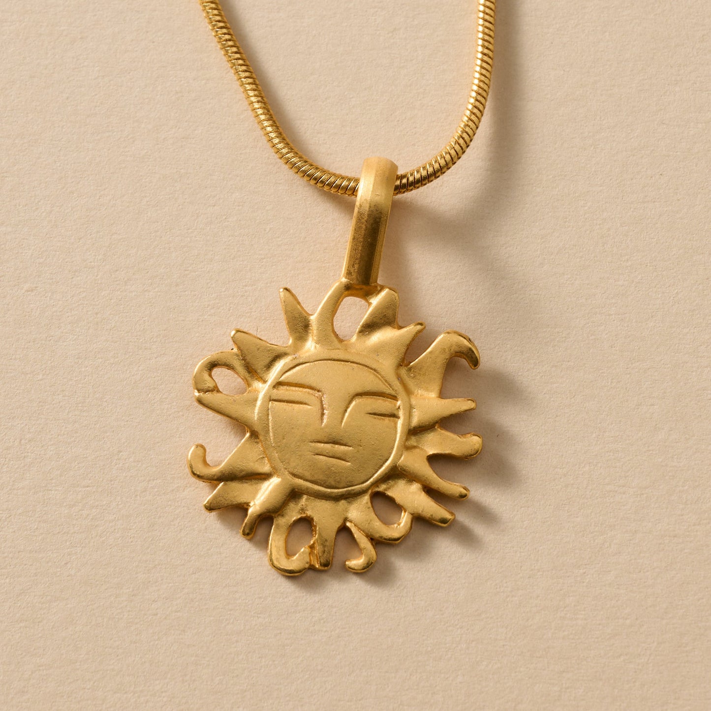 Calida Gold Plate Sun Pendant Necklace