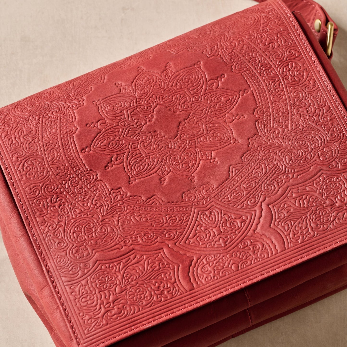 Kohra Embossed Leather Crossbody Bag