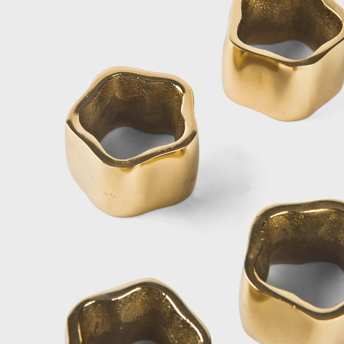 Gold Toned Sculpted Napkin Rings – Set of 4