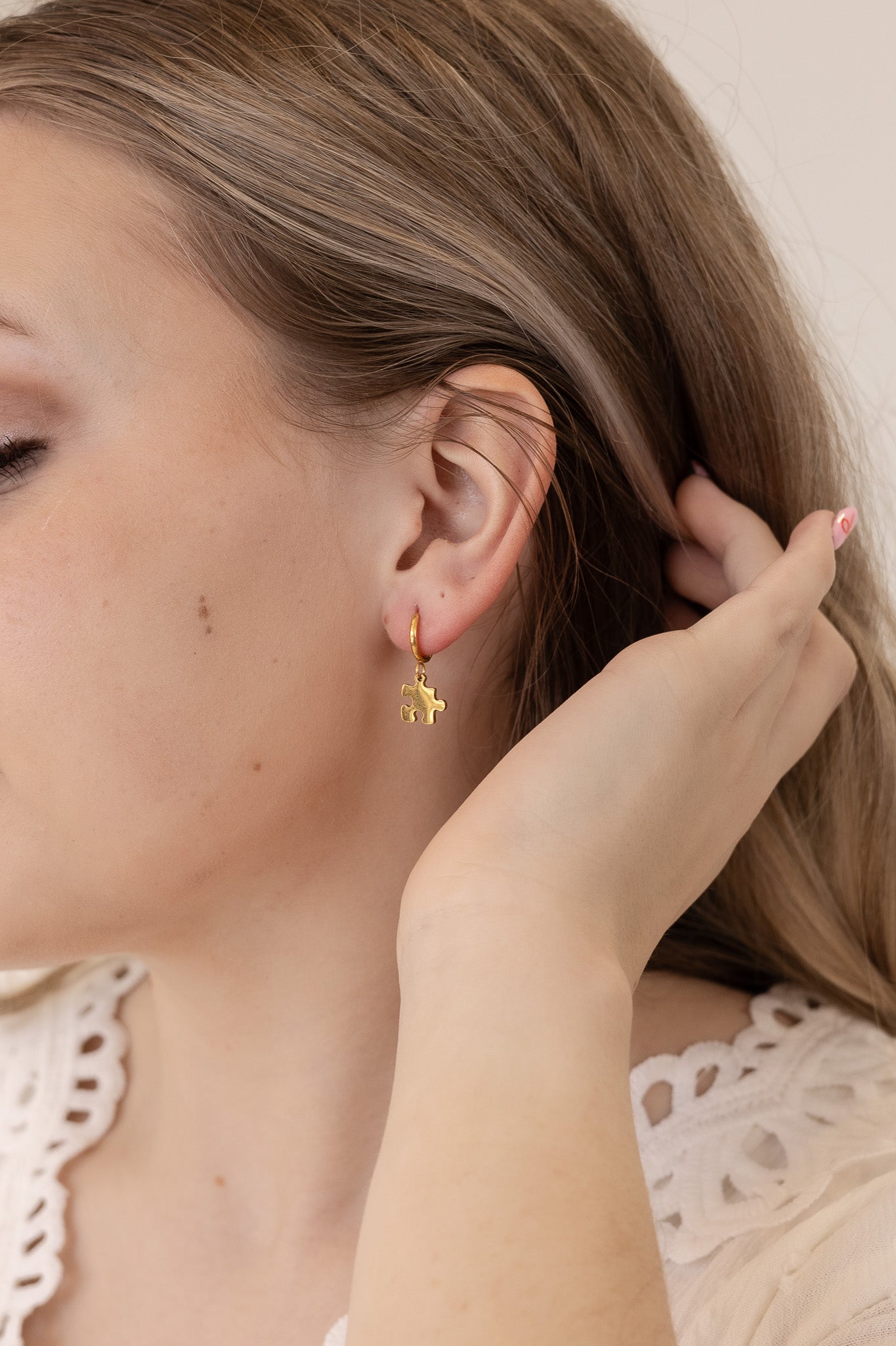 Puzzle Piece Huggie Hoops