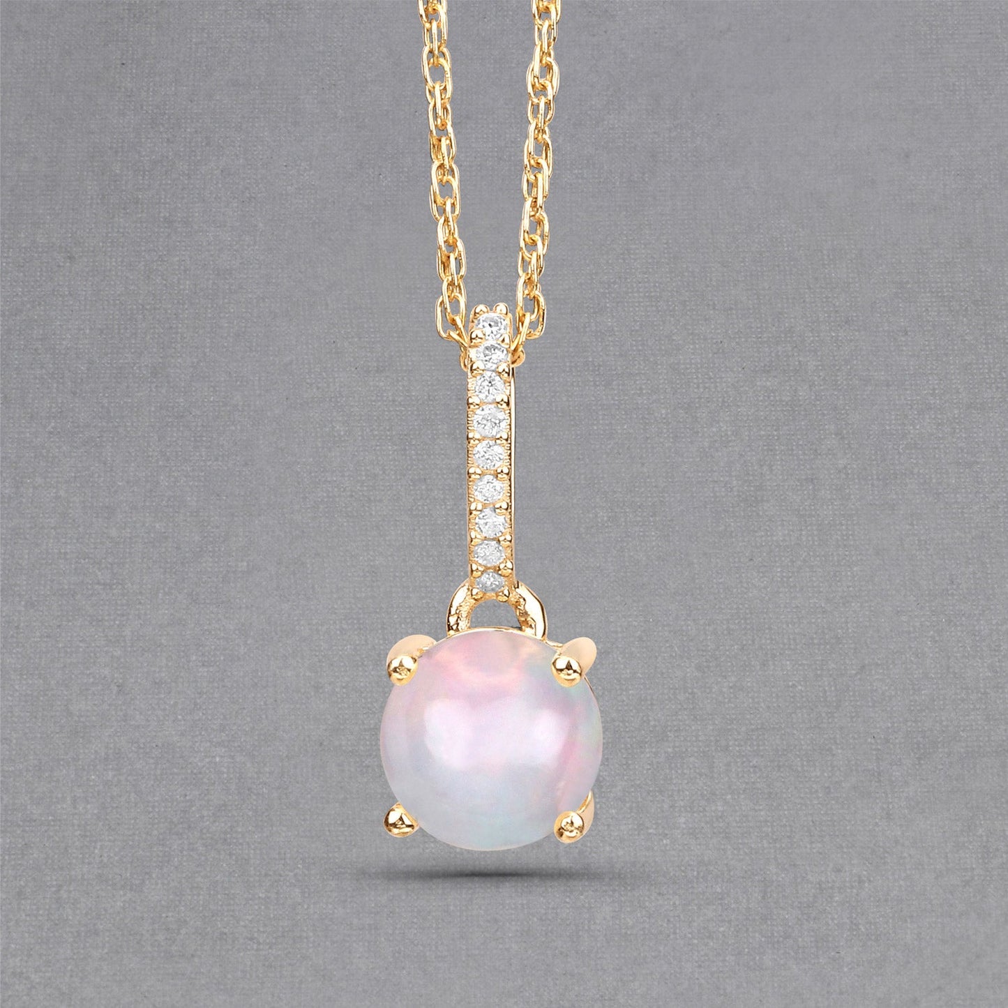 0.53 Carat Genuine Ethiopian Opal and White Diamond 10K Yellow Gold Pendant