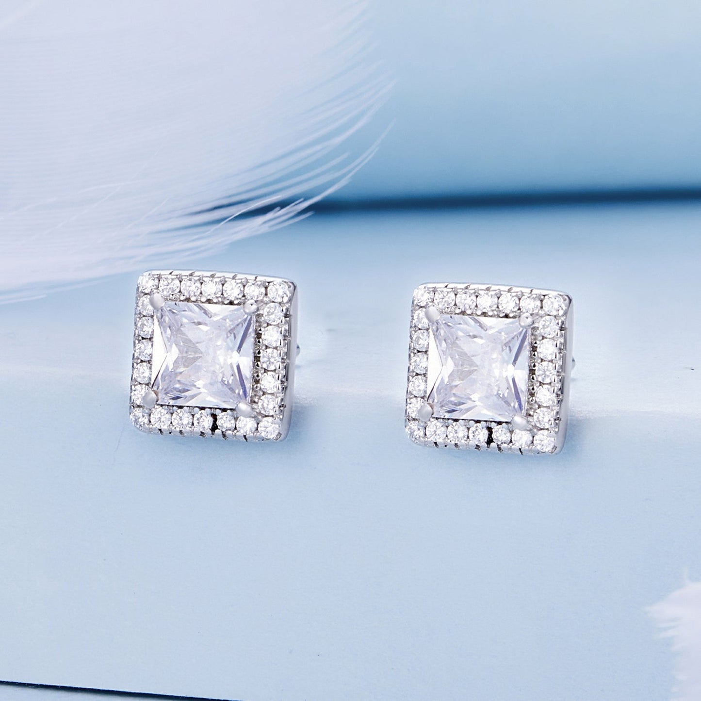 925 Sterling Silver Earrings with Pavé Setting CZ and Platinum Plating.