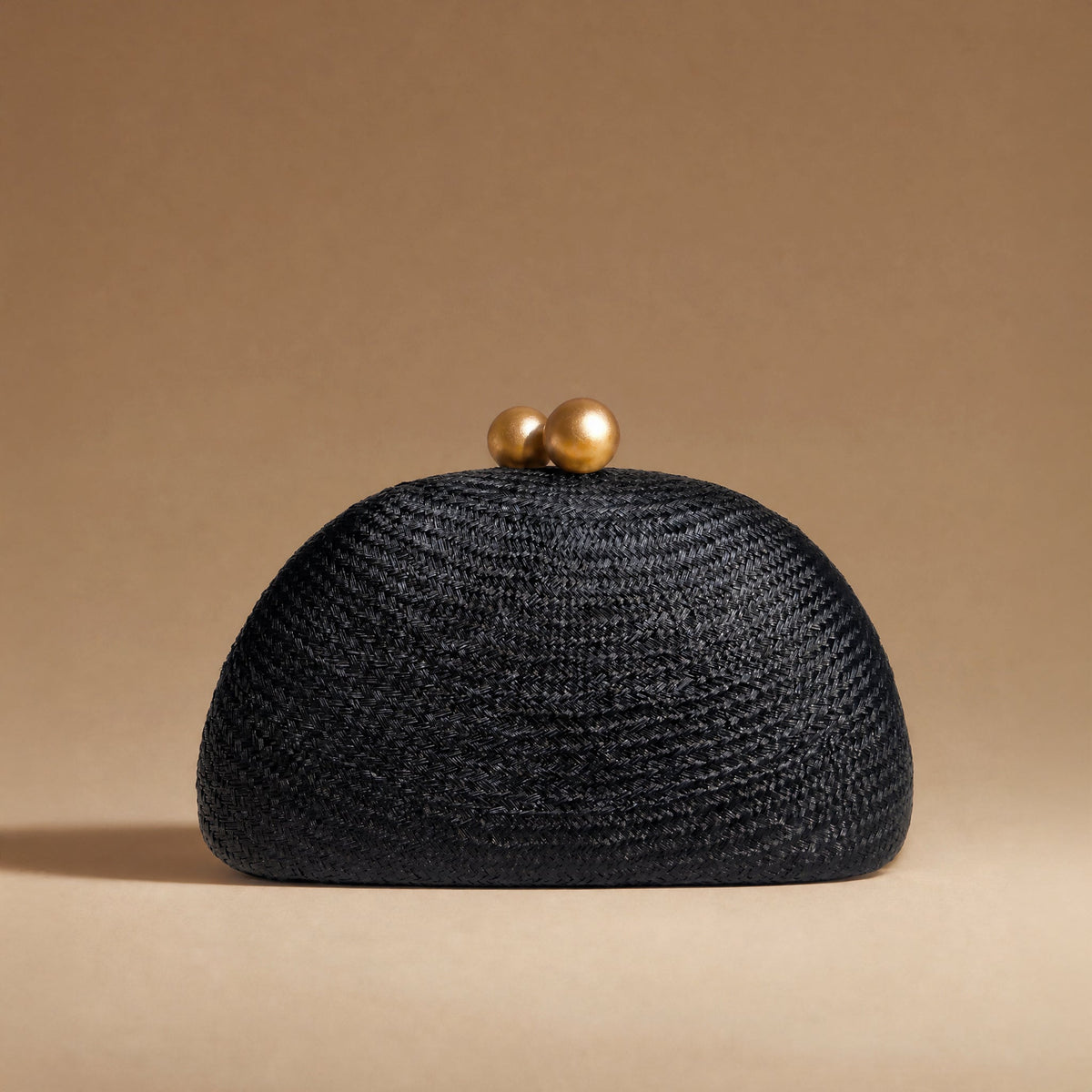 THE HELENA — Black Woven Straw Clutch with Gold Ball Clasp