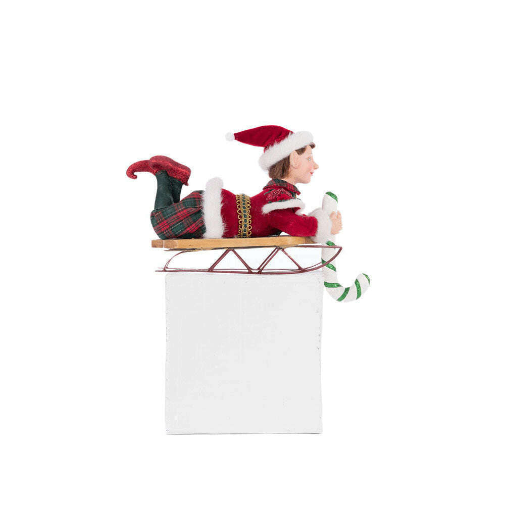 Laying Elf on Sled Stocking Holder by Katherine's Collection