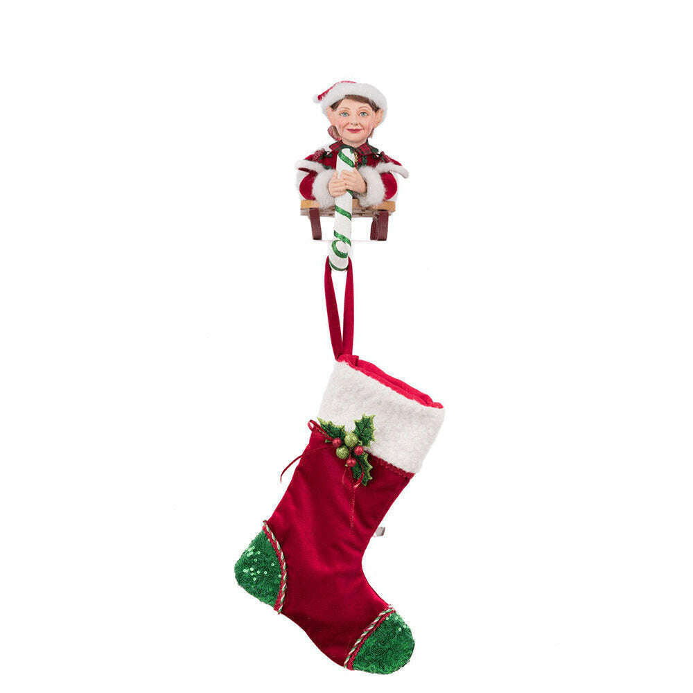 Laying Elf on Sled Stocking Holder by Katherine's Collection